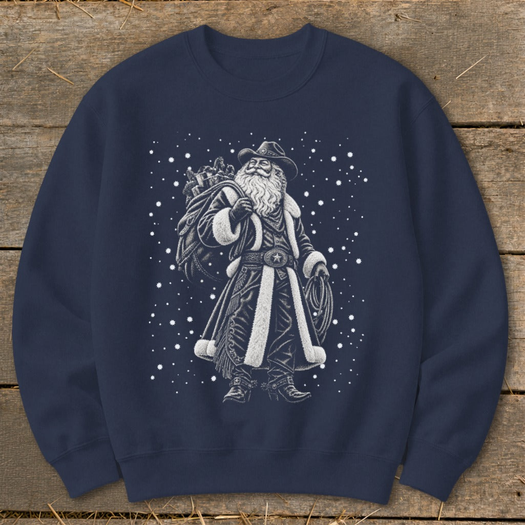 Cowboy Santa with sack of gifts and lasso on navy blue sweatshirt.