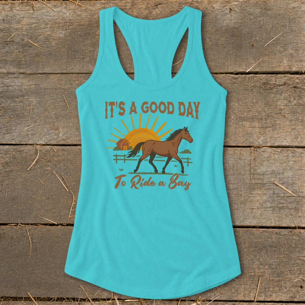 Turquoise tank top with a bay horse, barn, fence, and text "It's a good day to ride a bay."