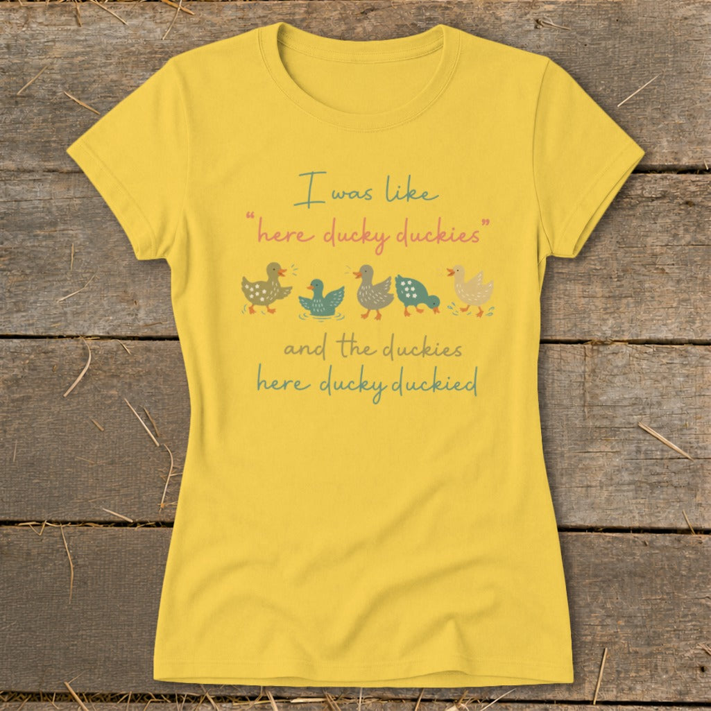Yellow t-shirt with text "I was like here ducky duckies and the duckies here ducky duckied." and ducks.