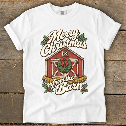 White t-shirt with a red barn, wreath, and text "Merry Christmas from the Barn".