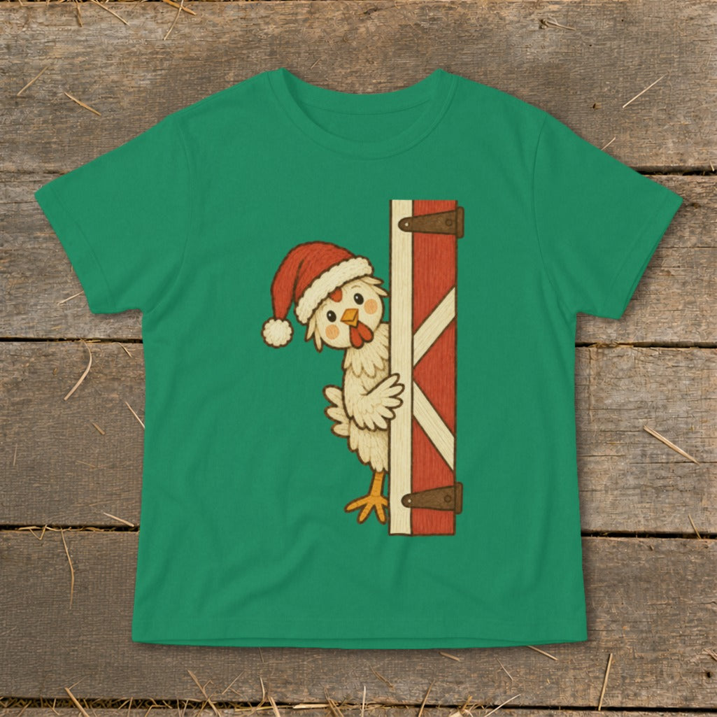 Green t-shirt with a cartoon chicken wearing a Santa hat peeking from behind a barn door.