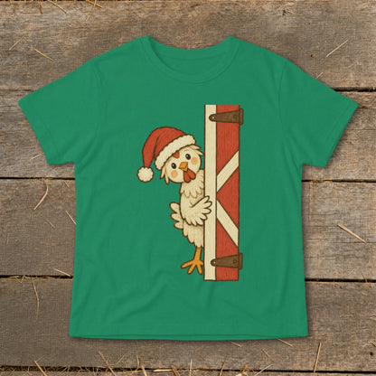 Green t-shirt with a cartoon chicken wearing a Santa hat peeking from behind a barn door.