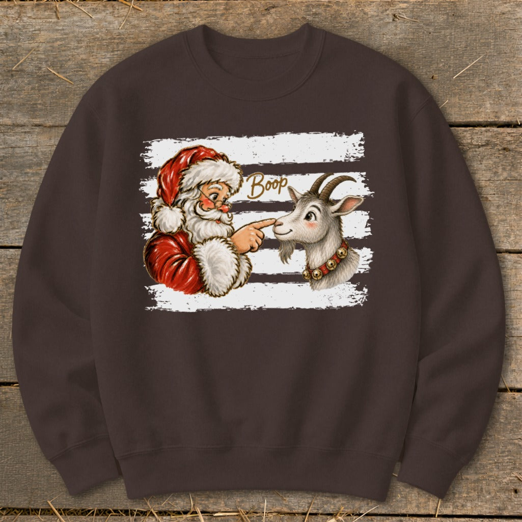 Santa booping a goat with the word "Boop" above.
