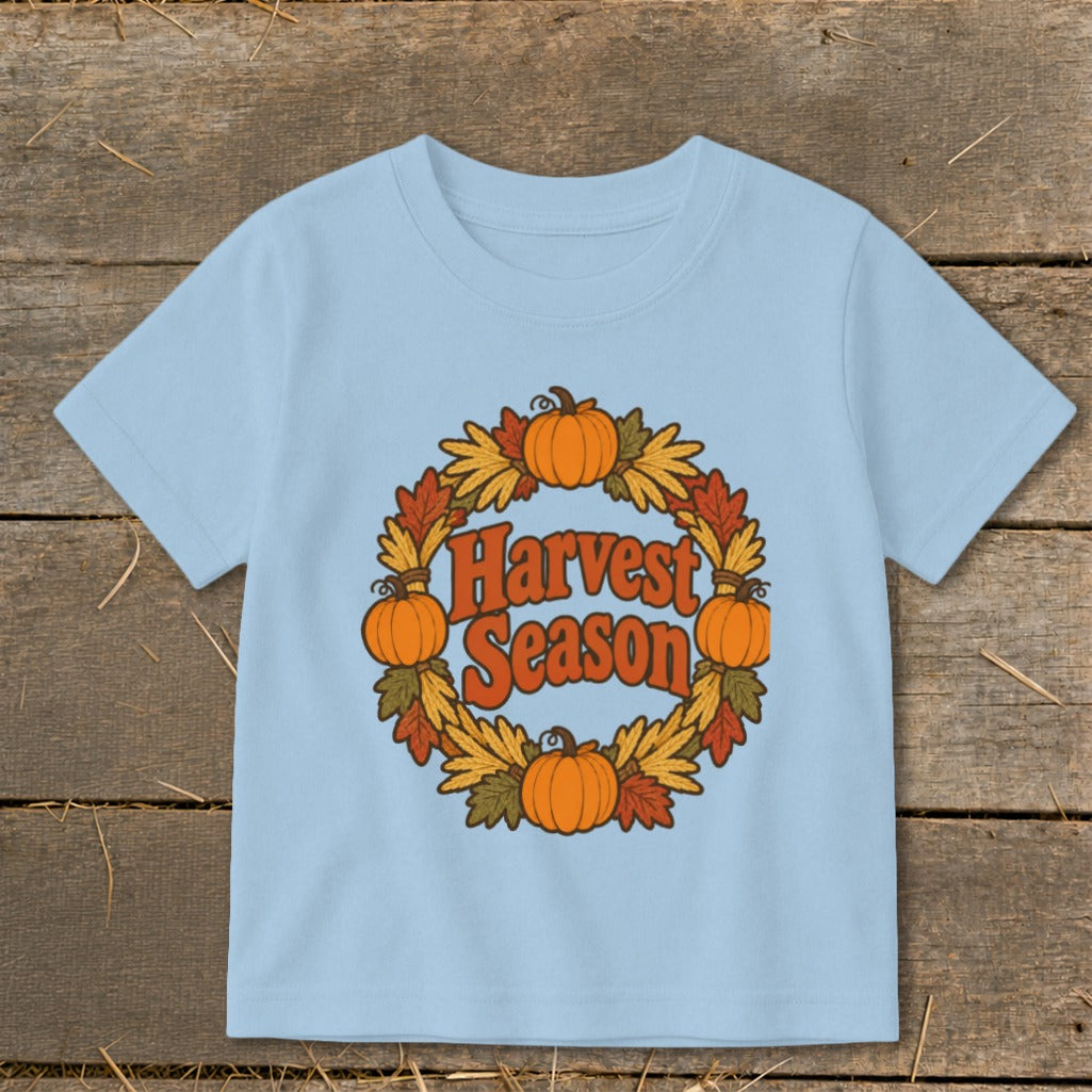 Light blue t-shirt with a "Harvest Season" graphic featuring pumpkins and autumn leaves.