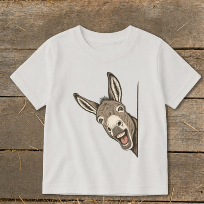 White t-shirt with a cartoon donkey peeking from the side with a wide smile.