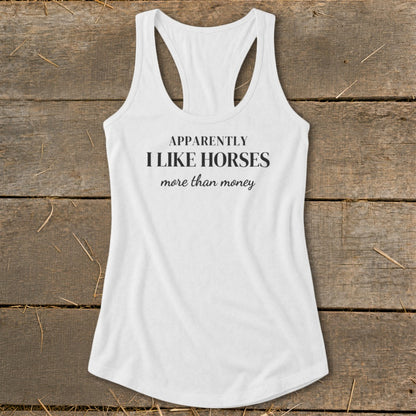 White tank top with text "Apparently I like horses more than money".