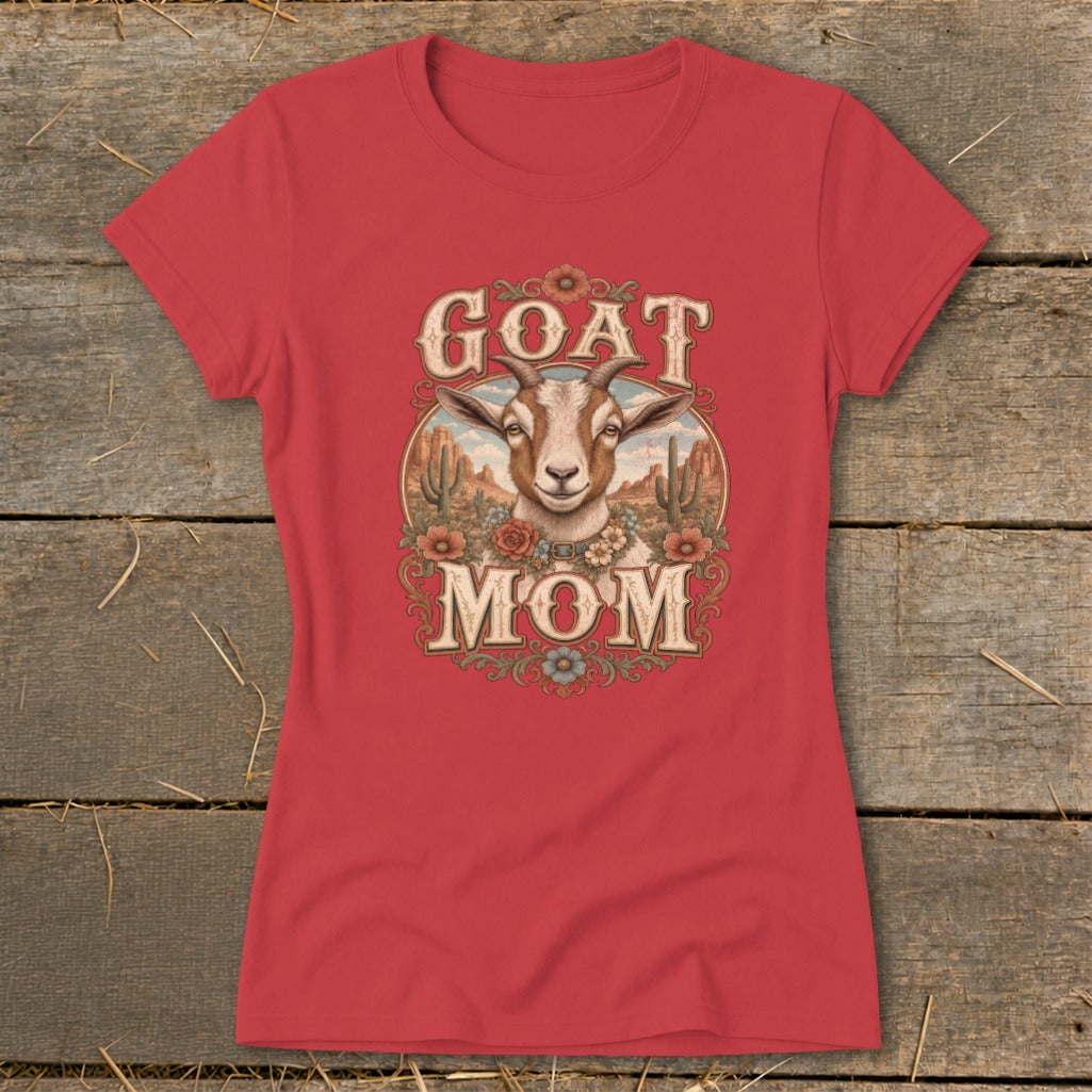 Red t-shirt with "GOAT MOM" text and a goat's head surrounded by desert scenery.