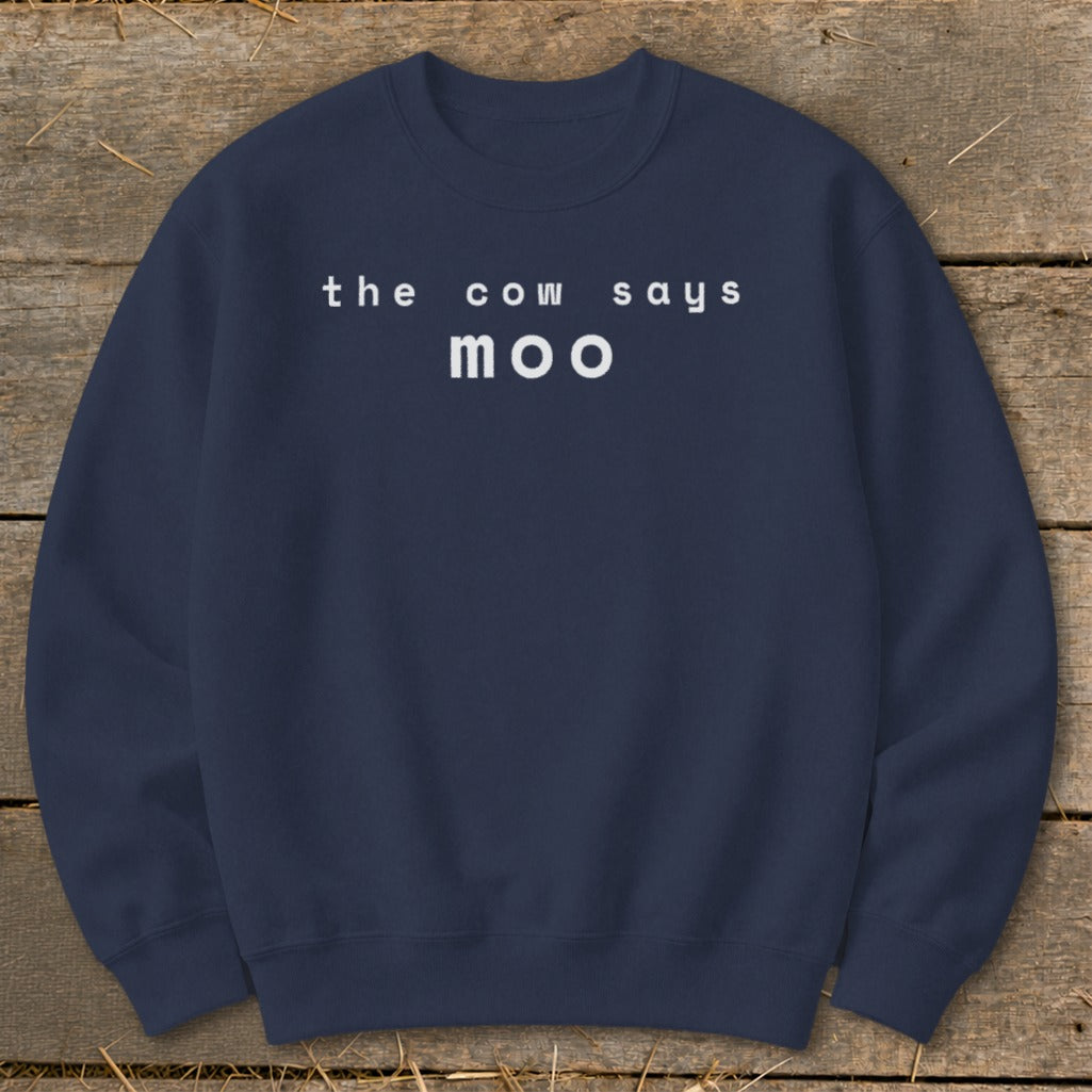 Navy sweatshirt with white text "the cow says moo".