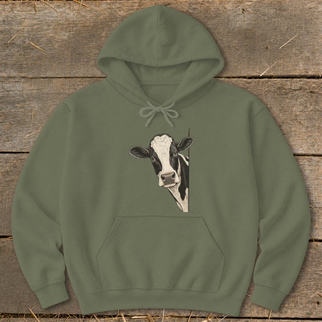 Olive green hoodie with a black and white cow peeking from the side.