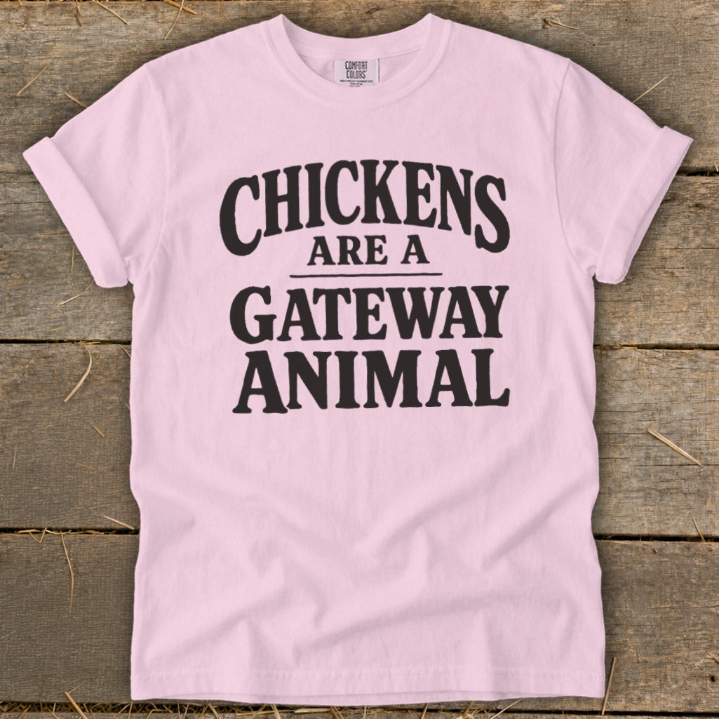Pink t-shirt with black text reading "CHICKENS ARE A GATEWAY ANIMAL"