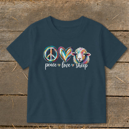 Dark blue t-shirt with peace, heart, and colorful sheep graphic and text.