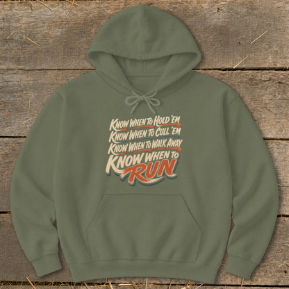 Green hoodie with text: "Know When to Hold 'Em Know When to Cull 'Em Know When to Walk Away Know When to Run".