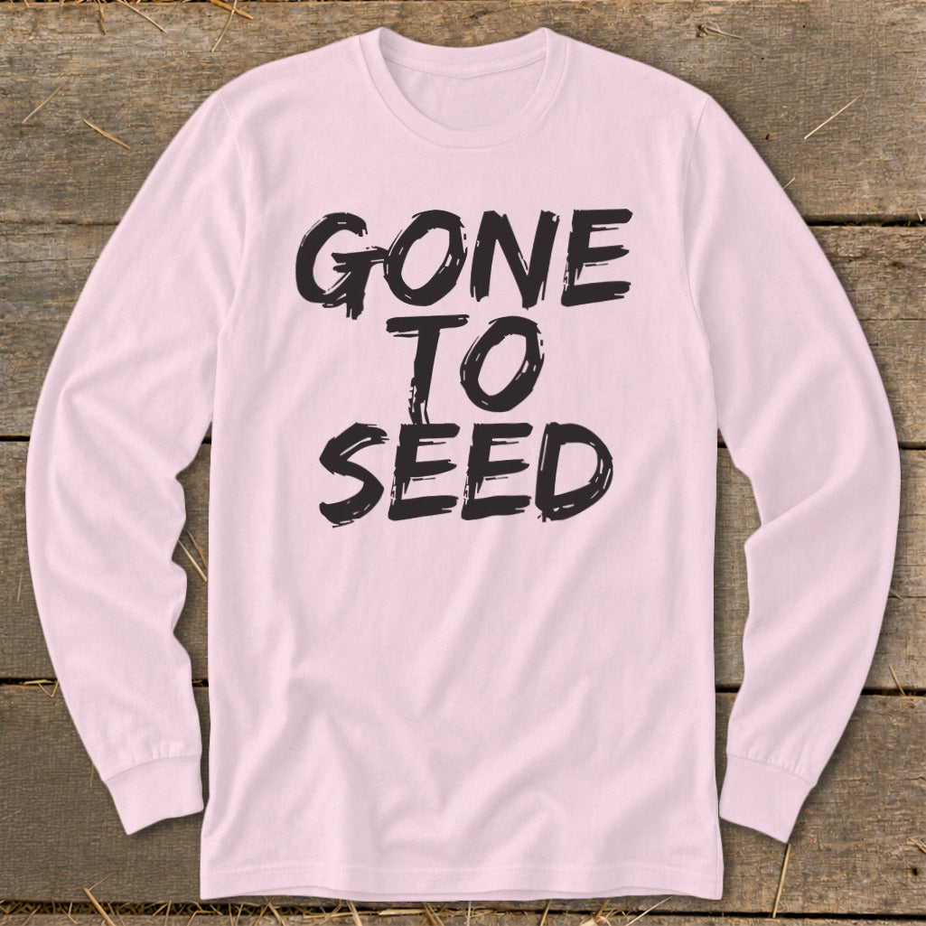 Pink long sleeve t-shirt with black text reading "GONE TO SEED".