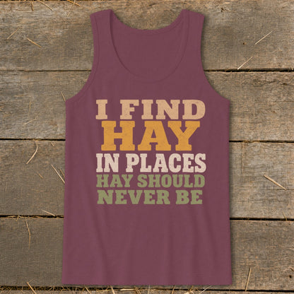 Maroon tank top with text: I FIND HAY IN PLACES HAY SHOULD NEVER BE