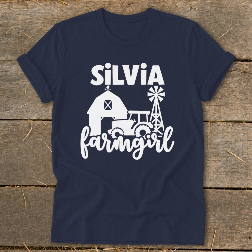 Navy t-shirt with white graphic "SILVIA farmgirl" and farm scene.