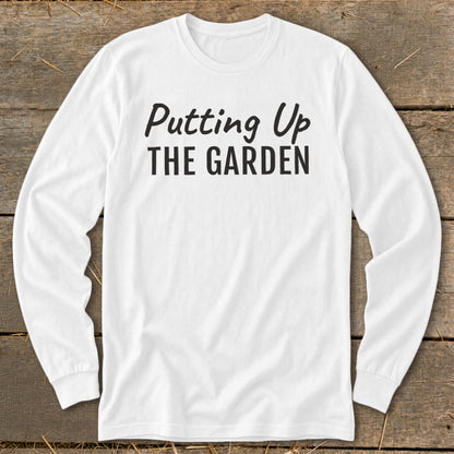 White long-sleeve shirt with black text "Putting Up THE GARDEN".