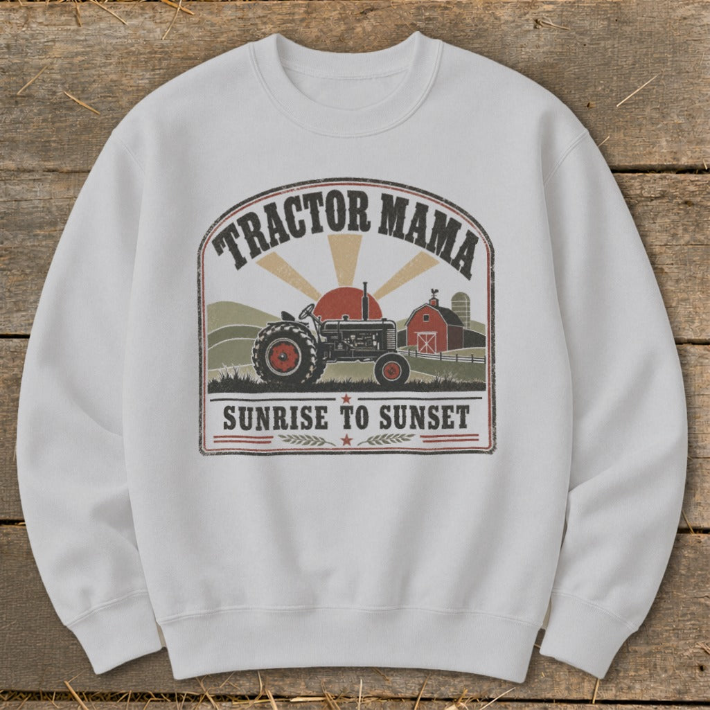 White sweatshirt with "Tractor Mama Sunrise to Sunset" graphic featuring a tractor and barn.