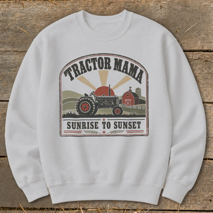 White sweatshirt with "Tractor Mama Sunrise to Sunset" graphic featuring a tractor and barn.