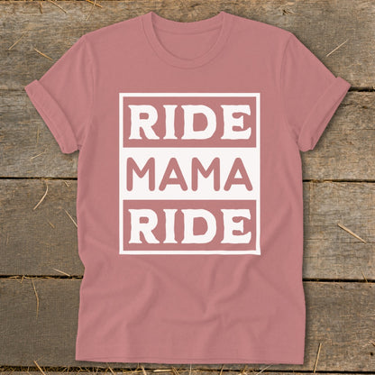 Pink t-shirt with white text reading "RIDE MAMA RIDE" in stacked blocks.