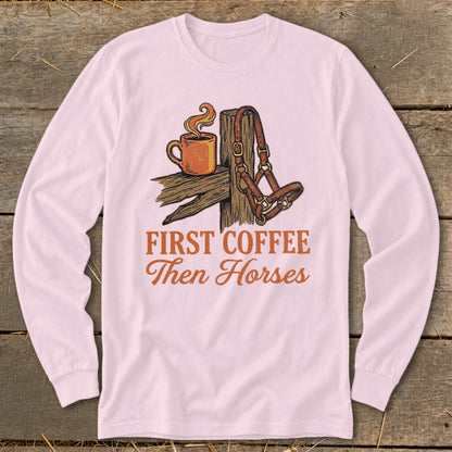 Long sleeve shirt with graphic of coffee cup, horse halter, and text "First Coffee Then Horses."