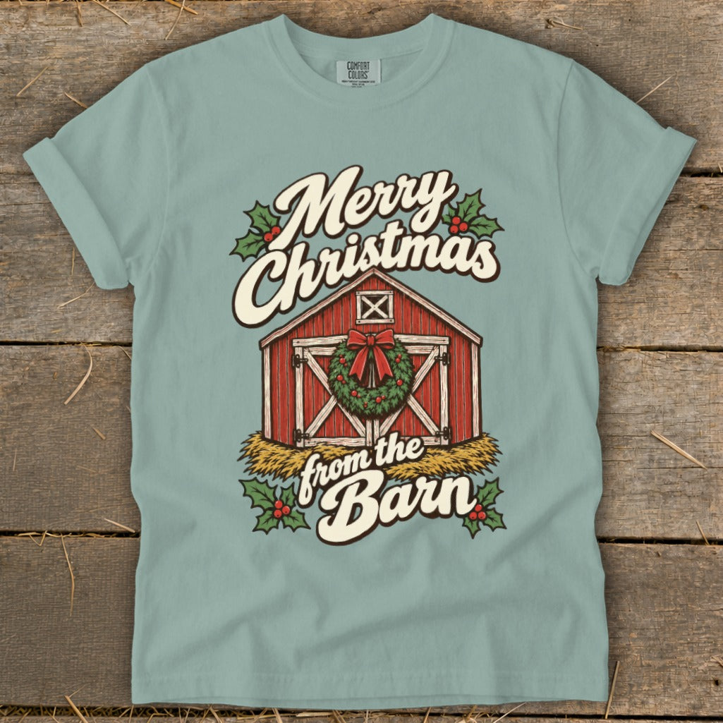 T-shirt graphic: "Merry Christmas from the Barn" with a red barn, wreath, and holly.