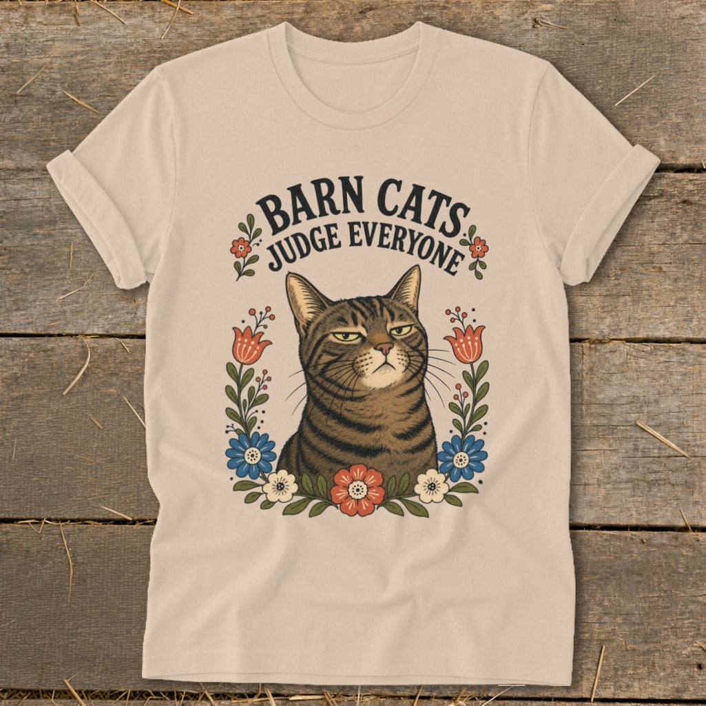 T-shirt with a judgmental tabby cat and text "Barn Cats Judge Everyone."