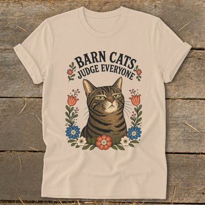 T-shirt with a judgmental tabby cat and text "Barn Cats Judge Everyone."