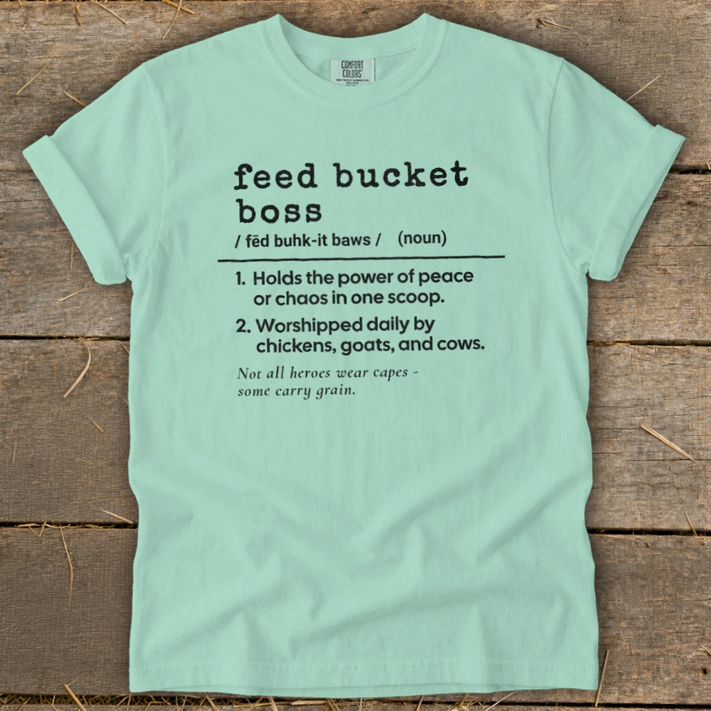 Light mint green t-shirt with "feed bucket boss" definition and farming humor text.