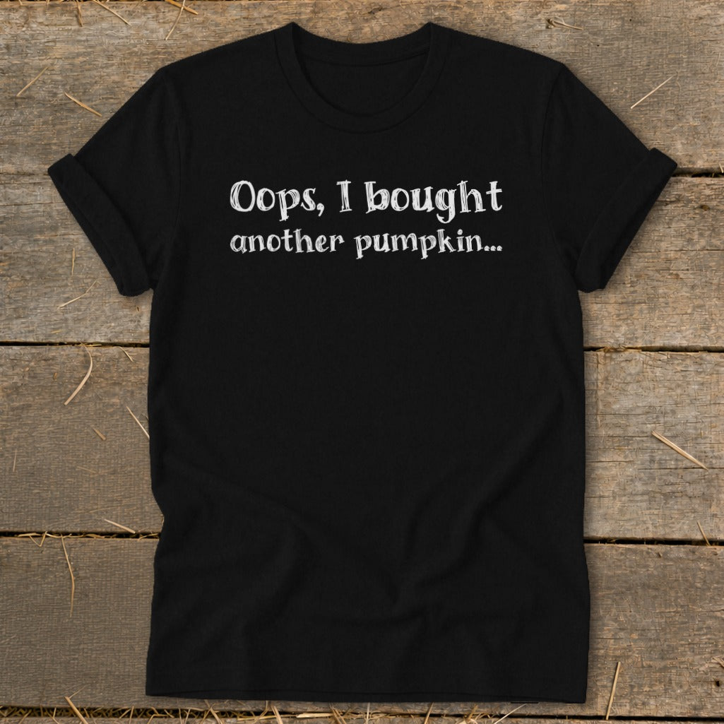 Black t-shirt with white text "Oops, I bought another pumpkin..."