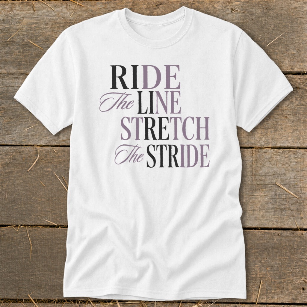 White t-shirt with the text "RIDE The LINE STRETCH The STRIDE" in various fonts and colors.