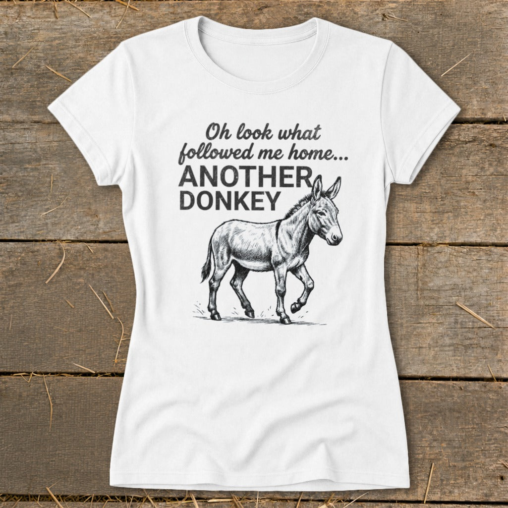 White t-shirt with "Oh look what followed me home... ANOTHER DONKEY" and a donkey drawing.
