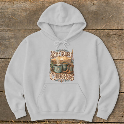 Grey hoodie with "But First, Chores" graphic featuring farm elements.
