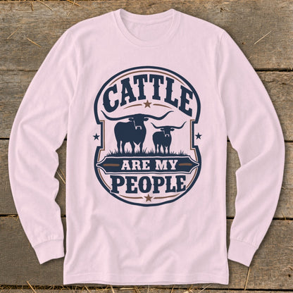 Long-sleeve shirt with "Cattle Are My People" text and longhorn cow graphic.