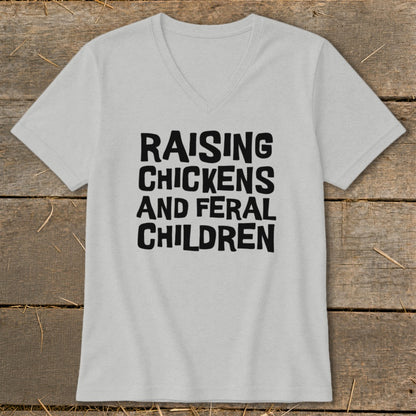 Light grey t-shirt with black text "RAISING CHICKENS AND FERAL CHILDREN".