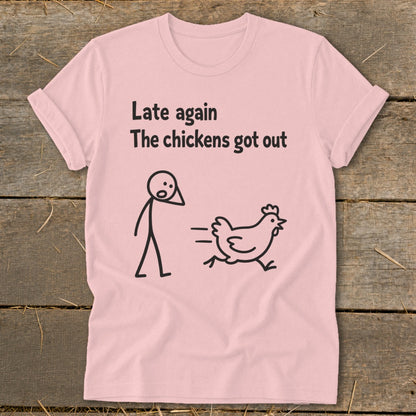 Pink t-shirt with "Late again The chickens got out" text and stick figures.