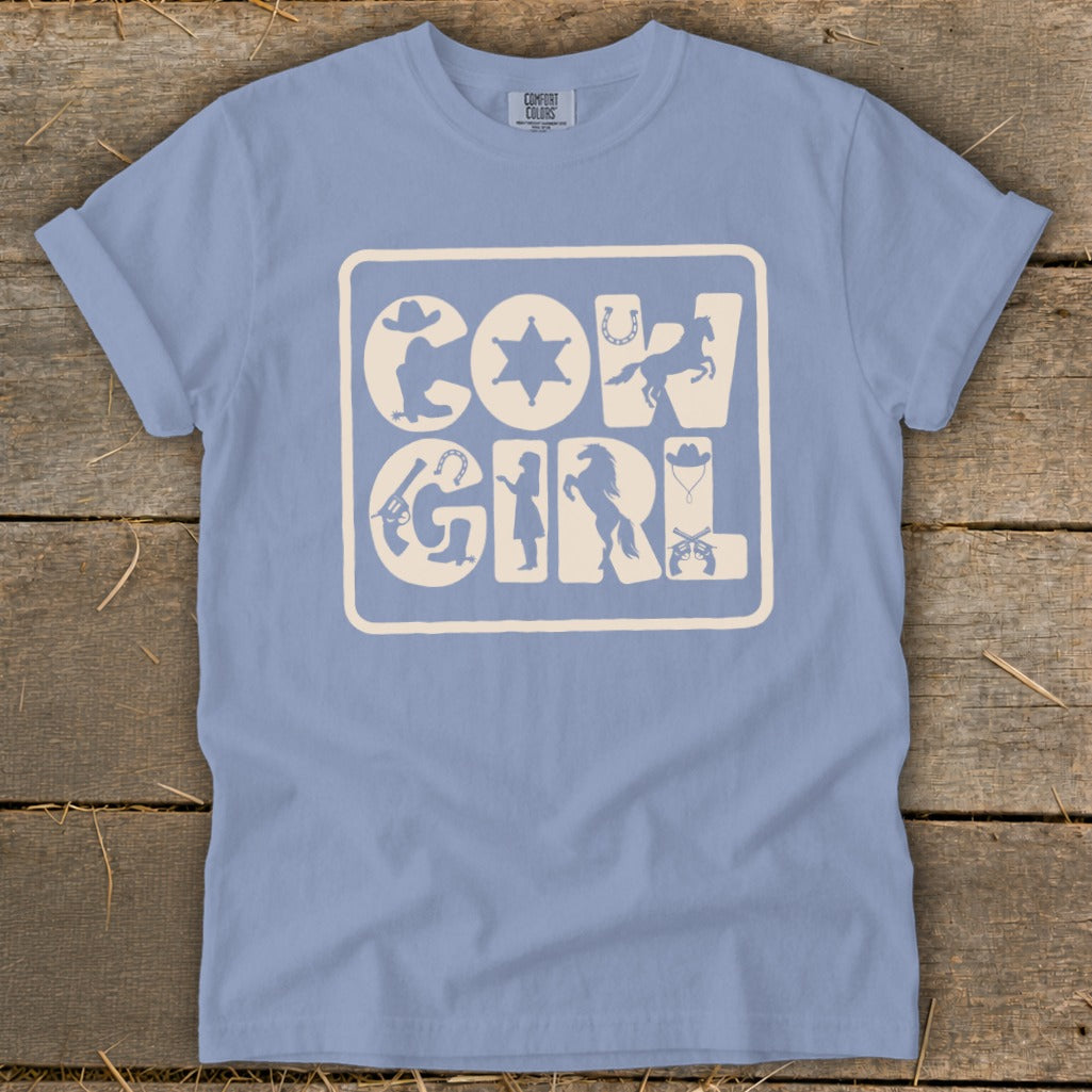 Light blue t-shirt with "COWGIRL" text and Western-themed icons.