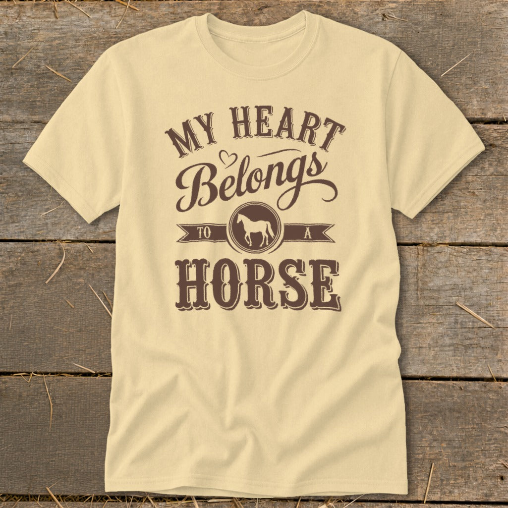Light yellow t-shirt with brown text "My Heart Belongs To A Horse" and horse graphic.