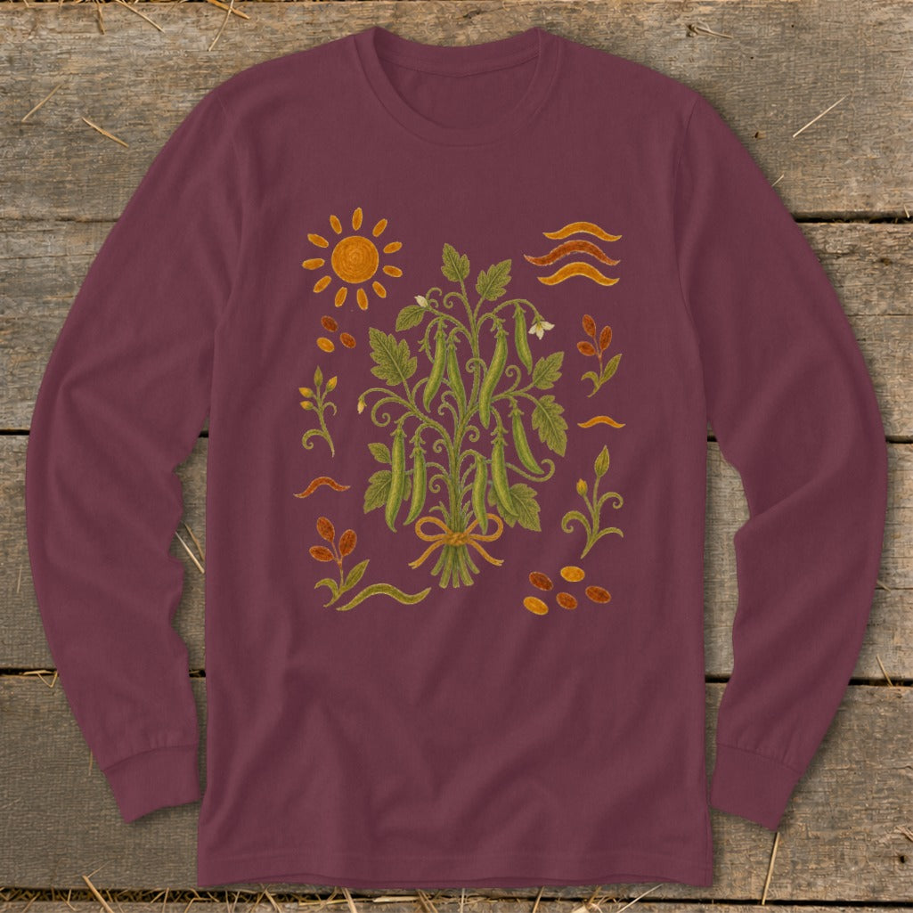 Maroon long-sleeve shirt with a central pea pod plant illustration and surrounding nature motifs.
