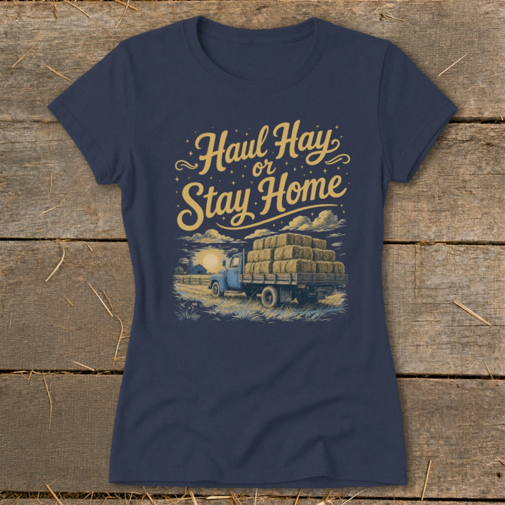 Navy t-shirt with "Haul Hay or Stay Home" text and hay truck graphic.