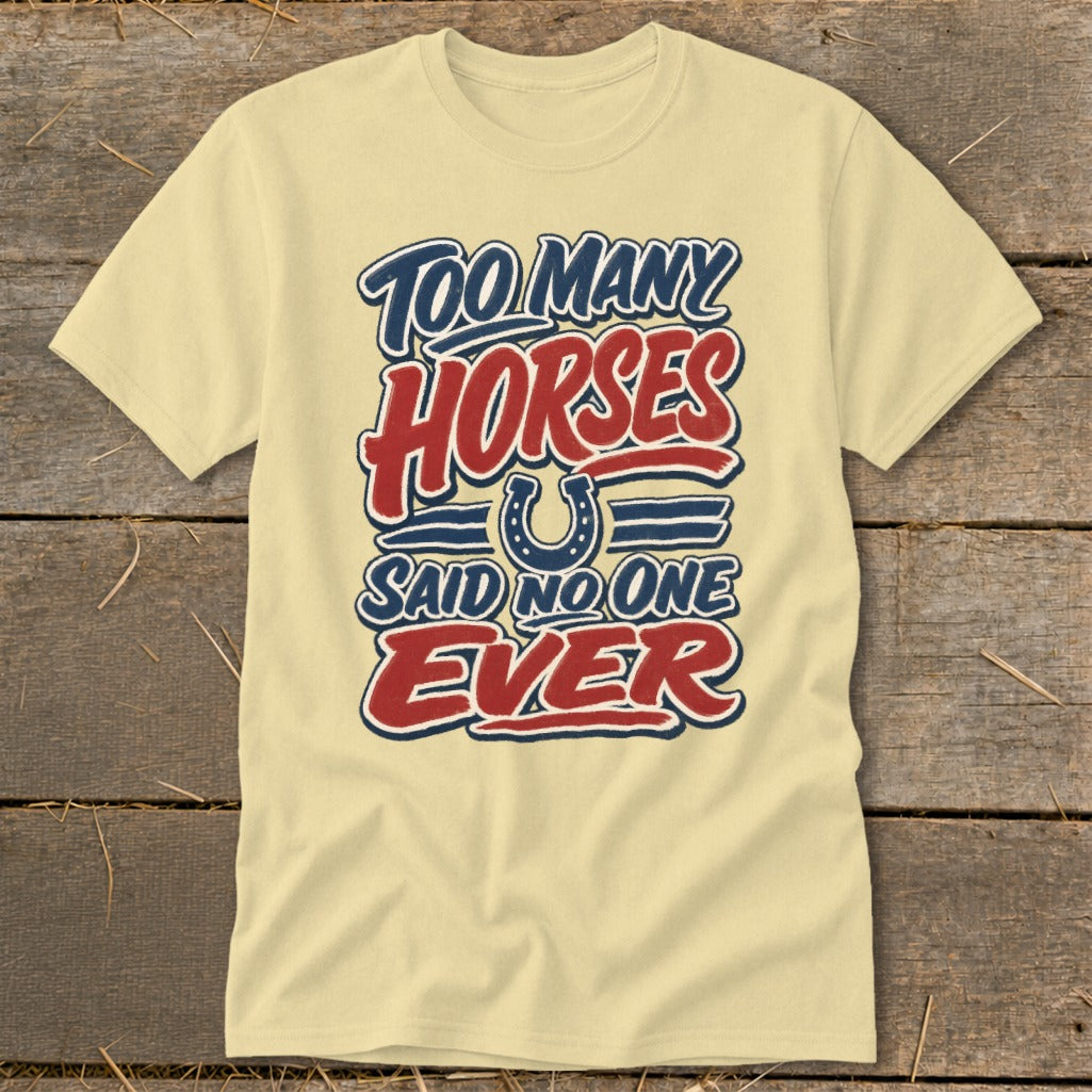 Light yellow t-shirt with "Too Many Horses Said No One Ever" text and horseshoe graphic.