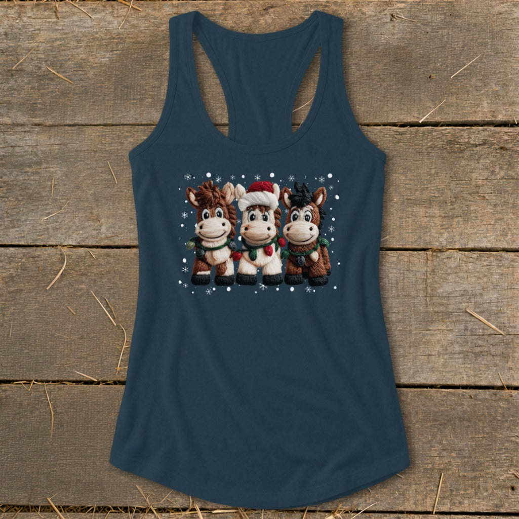 Three cartoon horses wearing scarves and a Santa hat, with snowflakes.