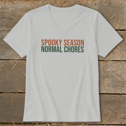 Light gray v-neck t-shirt with "Spooky Season Normal Chores" text.