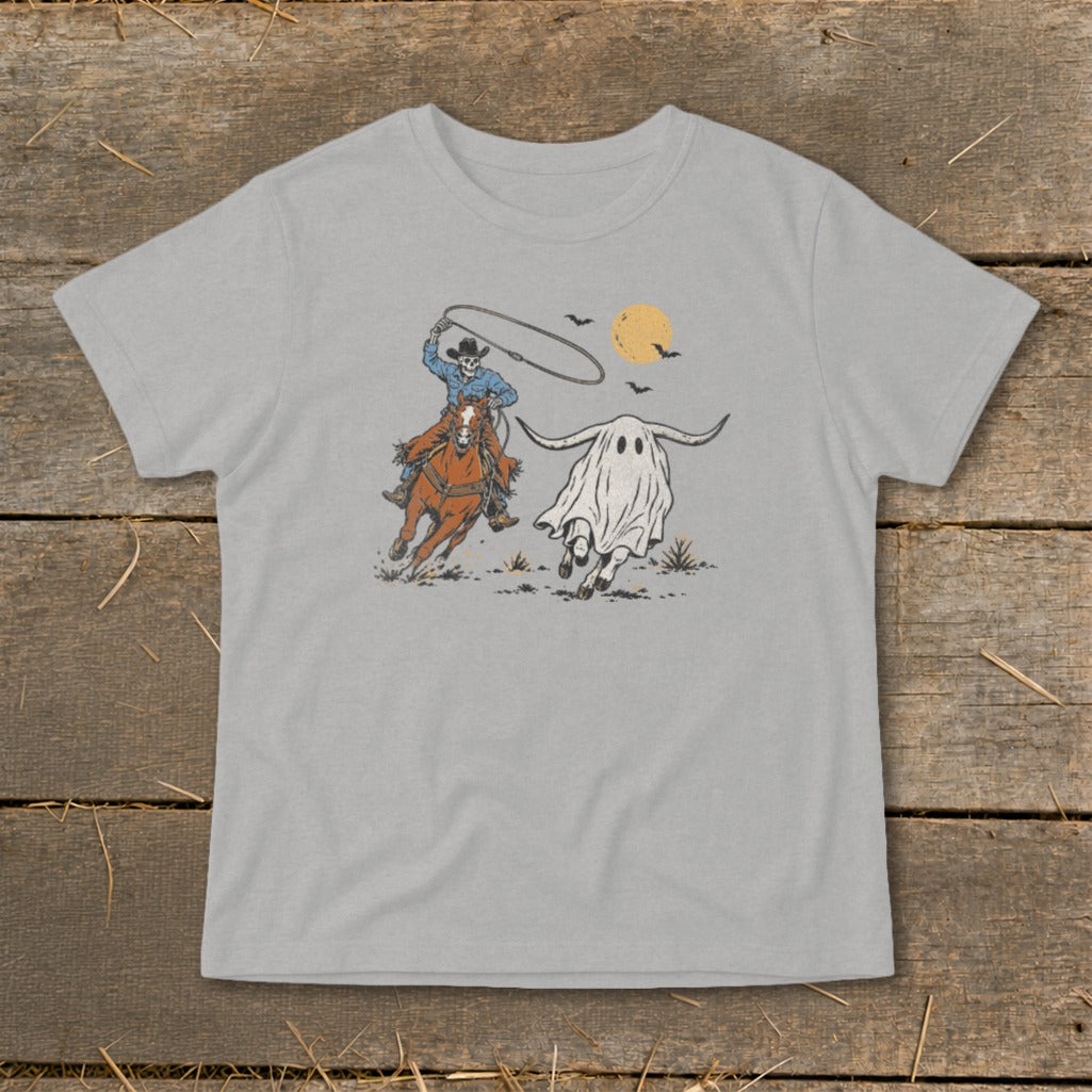 Cowboy on horseback lassoing a ghost that looks like a longhorn bull.