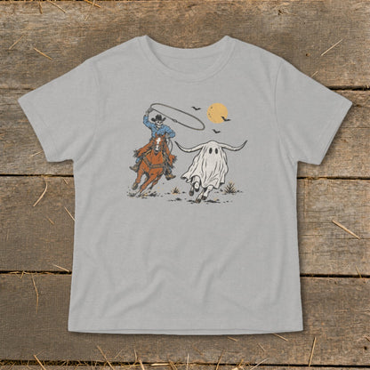 Cowboy on horseback lassoing a ghost that looks like a longhorn bull.
