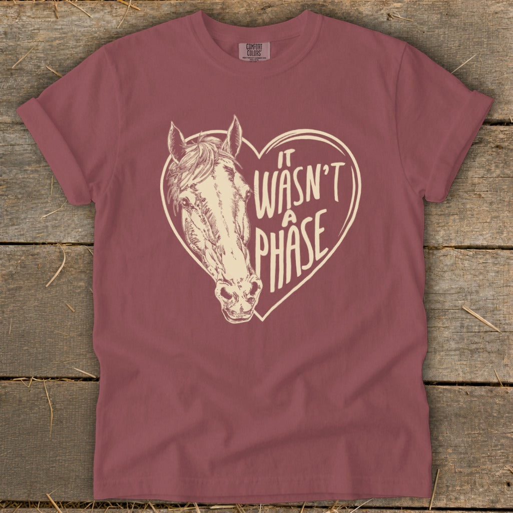 Maroon t-shirt with horse head and heart graphic with text "It Wasn't A Phase."