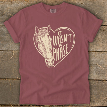 Maroon t-shirt with horse head and heart graphic with text "It Wasn't A Phase."