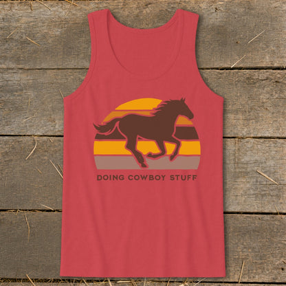 Red tank top with running horse silhouette and "DOING COWBOY STUFF" text.