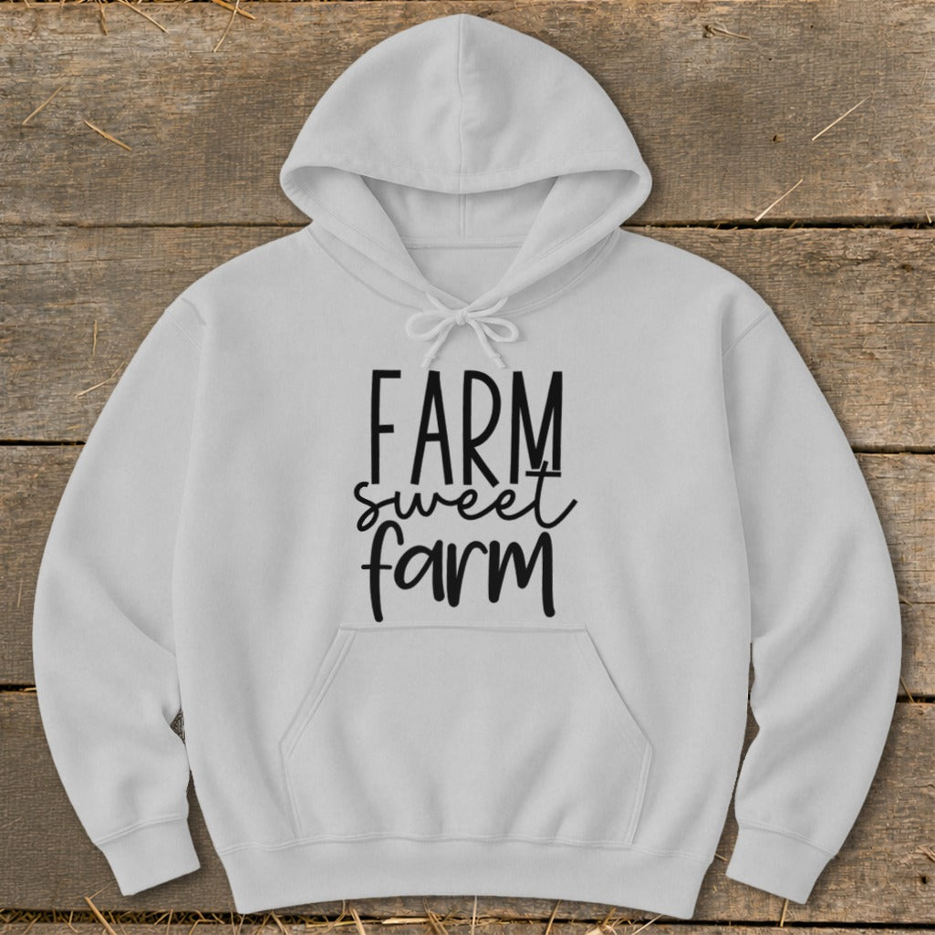 White hoodie with "FARM sweet farm" text graphic.