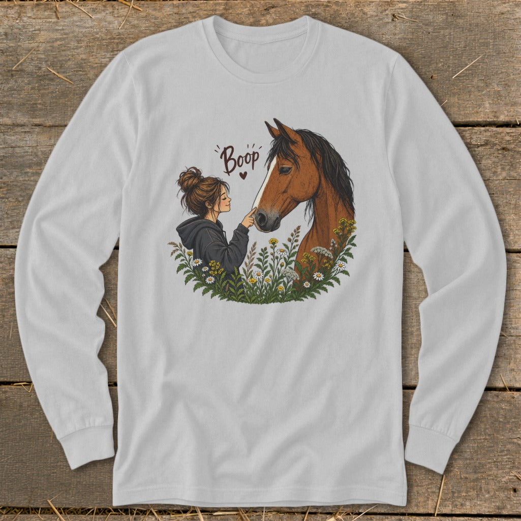 Illustration of girl touching horse's nose, with "Boop" text and flowers.