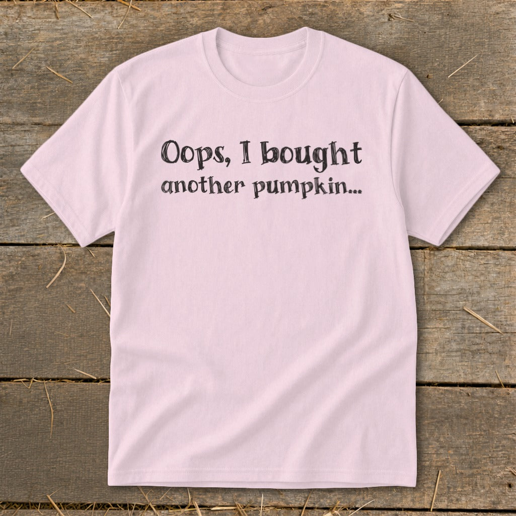 Pink t-shirt with black text: "Oops, I bought another pumpkin..."